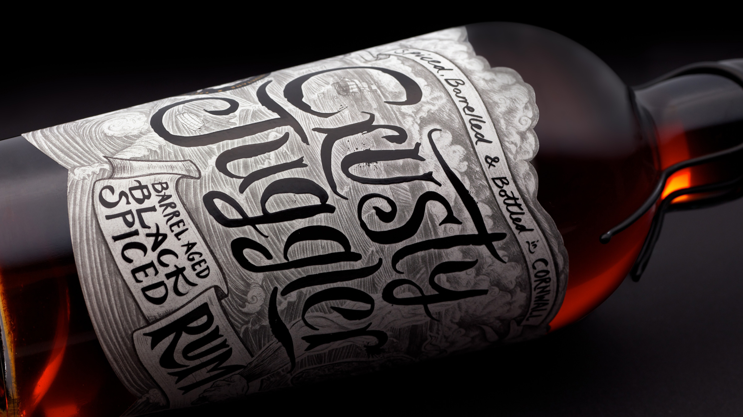 A New Legend to Behold: Adventurous Black Spiced Rum From the Cornish Coast Designed by Kingdom & Sparrow