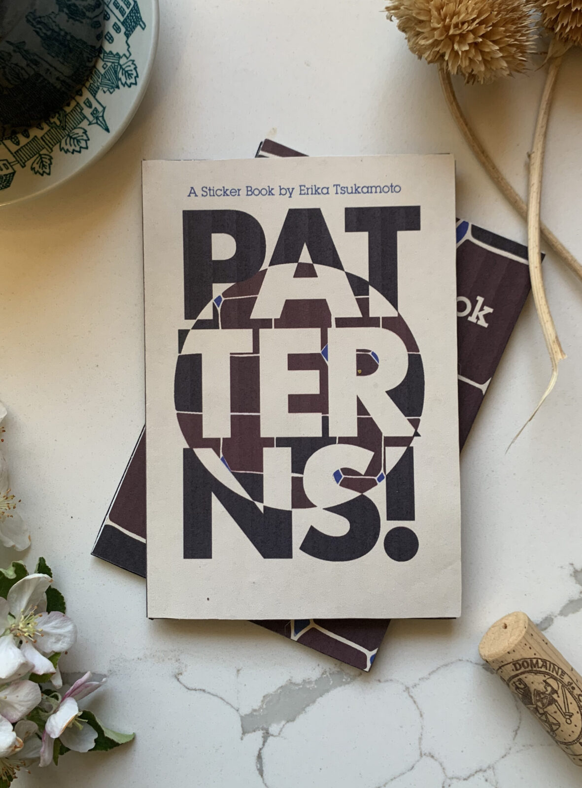 Student Erika Tsukamoto Creates a Visually Unified Western Adult Sticker Book With Hand-Drawn Illustrations