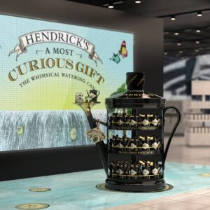 Hendrick’s Whimsical Watering Can Reinforces Brand Storytelling in Travel Retail by Boundless Brand Design