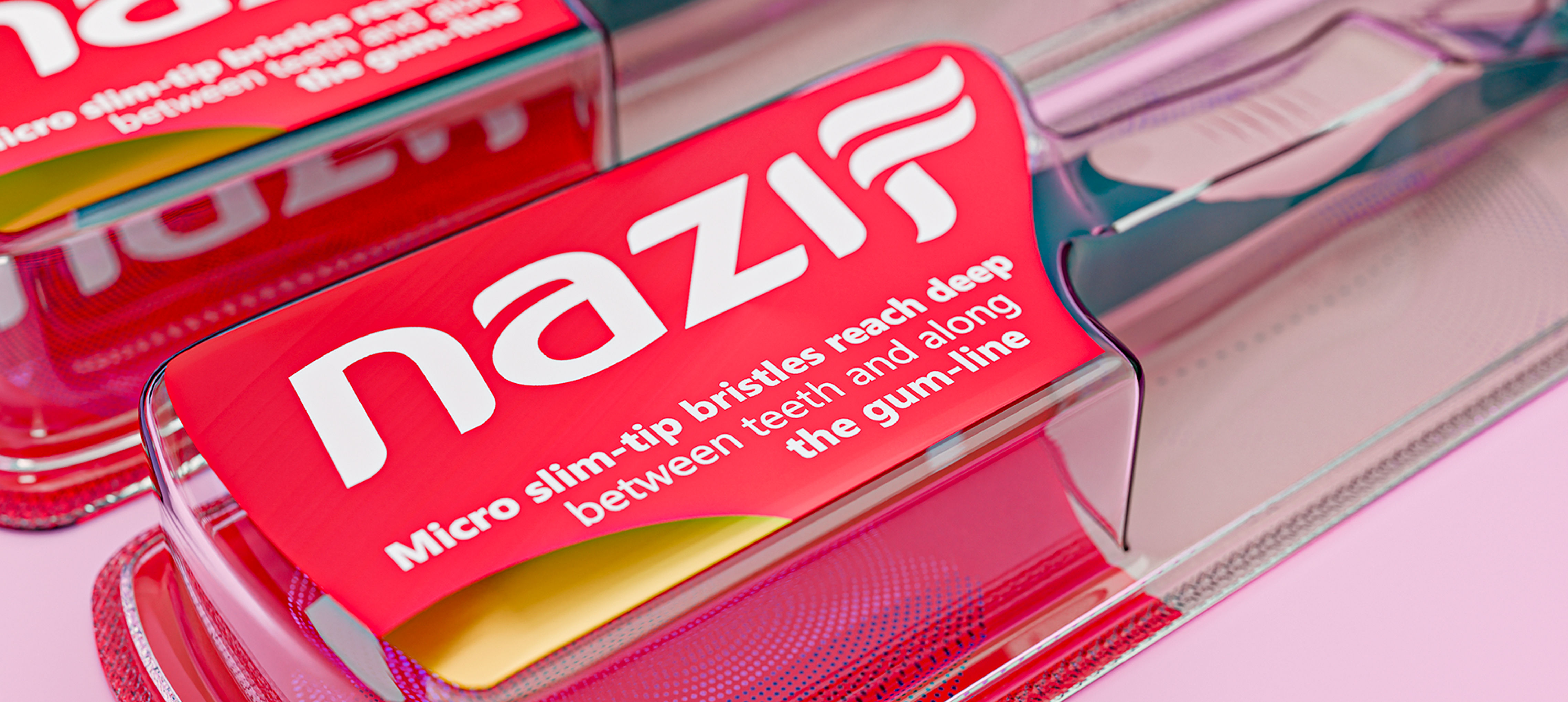 Nazif Toothbrush Packaging Design by Minim Design Builds Instant Shelf Recognition With a Signature Red System